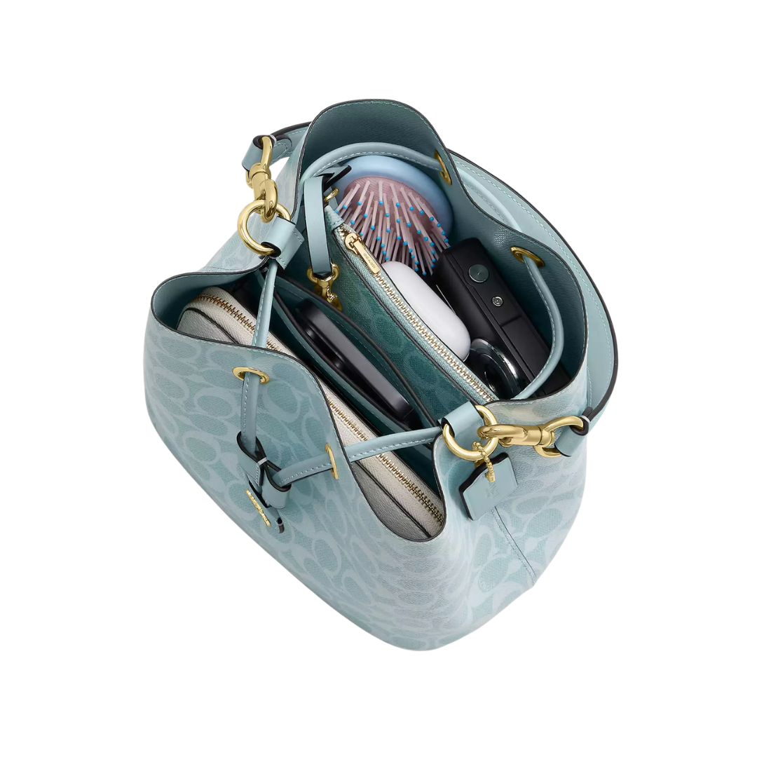 Rowan Bucket Bag In Signature Canvas Blue